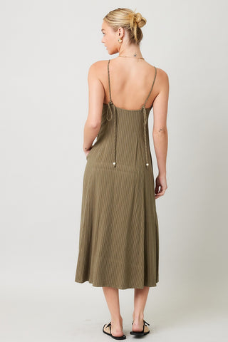 olive linen stripe midi dress back view showing tied straps with bead