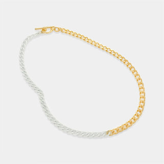 A two-tone curb chain necklace with a toggle clasp, featuring half gold and half white enamel.