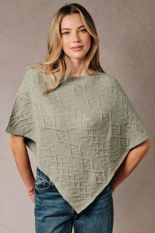 CABLE KNIT PONCHO SWEATER