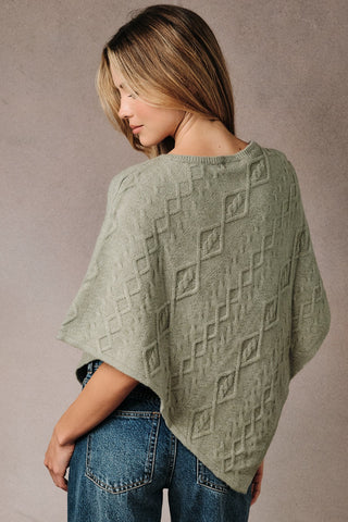 CABLE KNIT PONCHO SWEATER