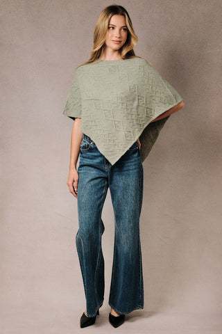 CABLE KNIT PONCHO SWEATER
