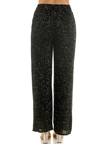 Black glittery pants on a white background
