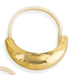 Three gold rings with unique designs on a white background