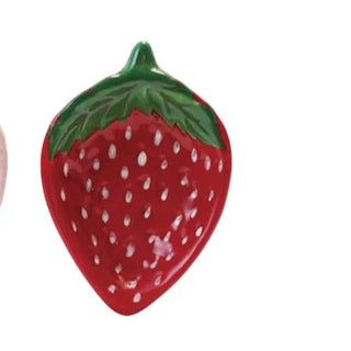 Two strawberry-shaped earrings on a white background