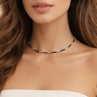 Necklace on a model with a neutral background