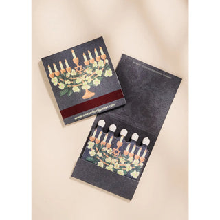 Set of cards with candelabra design on a beige background