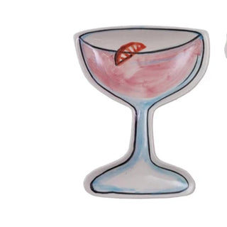 Two ceramic cocktail glass-shaped dishes with decorative elements on a white background