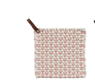 Single mauve and white cotton crochet pot holder with leather loop, displayed on white background.