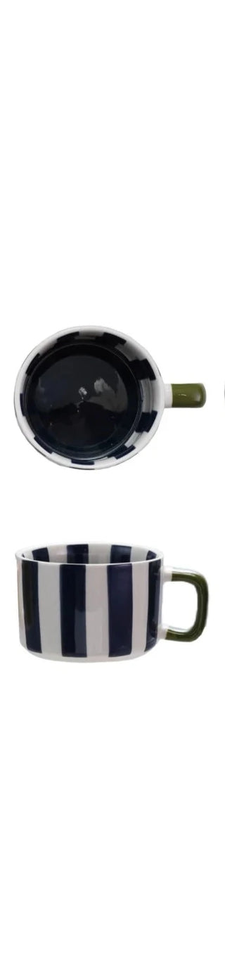 Hand-painted stoneware mug with bold navy stripes and a contrasting olive green handle. Classic, durable, and dishwasher safe — ideal for your everyday brew with a pop of personality.