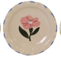 floral ceramic plates with floral designs on a white background