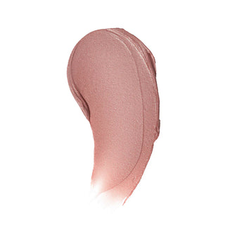 Nude-colored makeup swatch on a white background