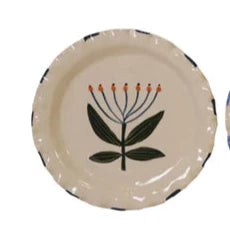 Floral ceramic plates with floral designs on a white background