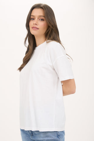 Woman wearing a white t-shirt on a white background